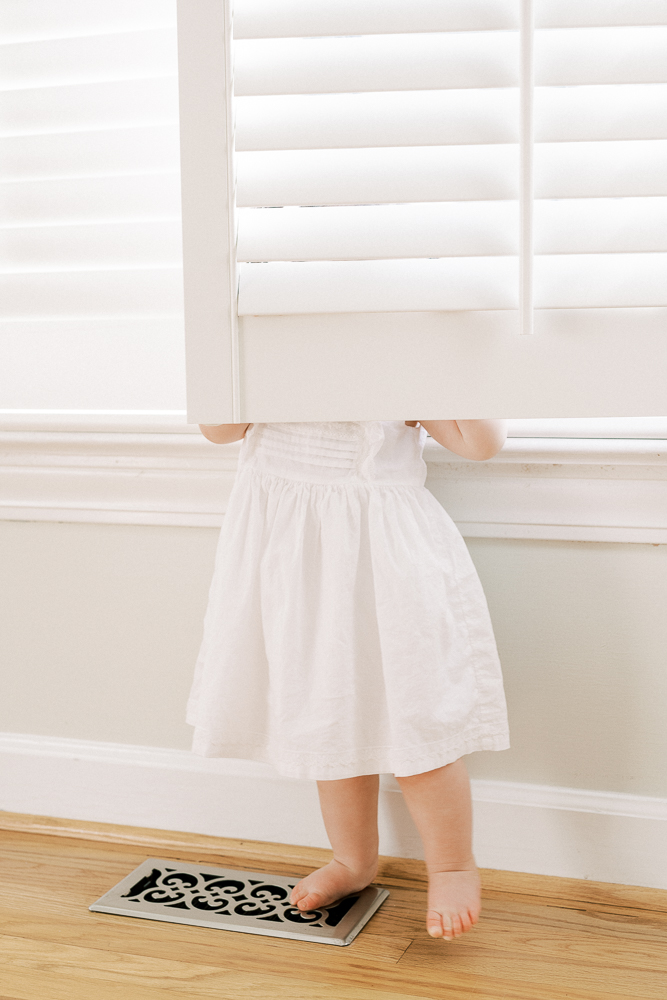 columbia-sc-family-photographer-in home- photography - girl-hiding-in home